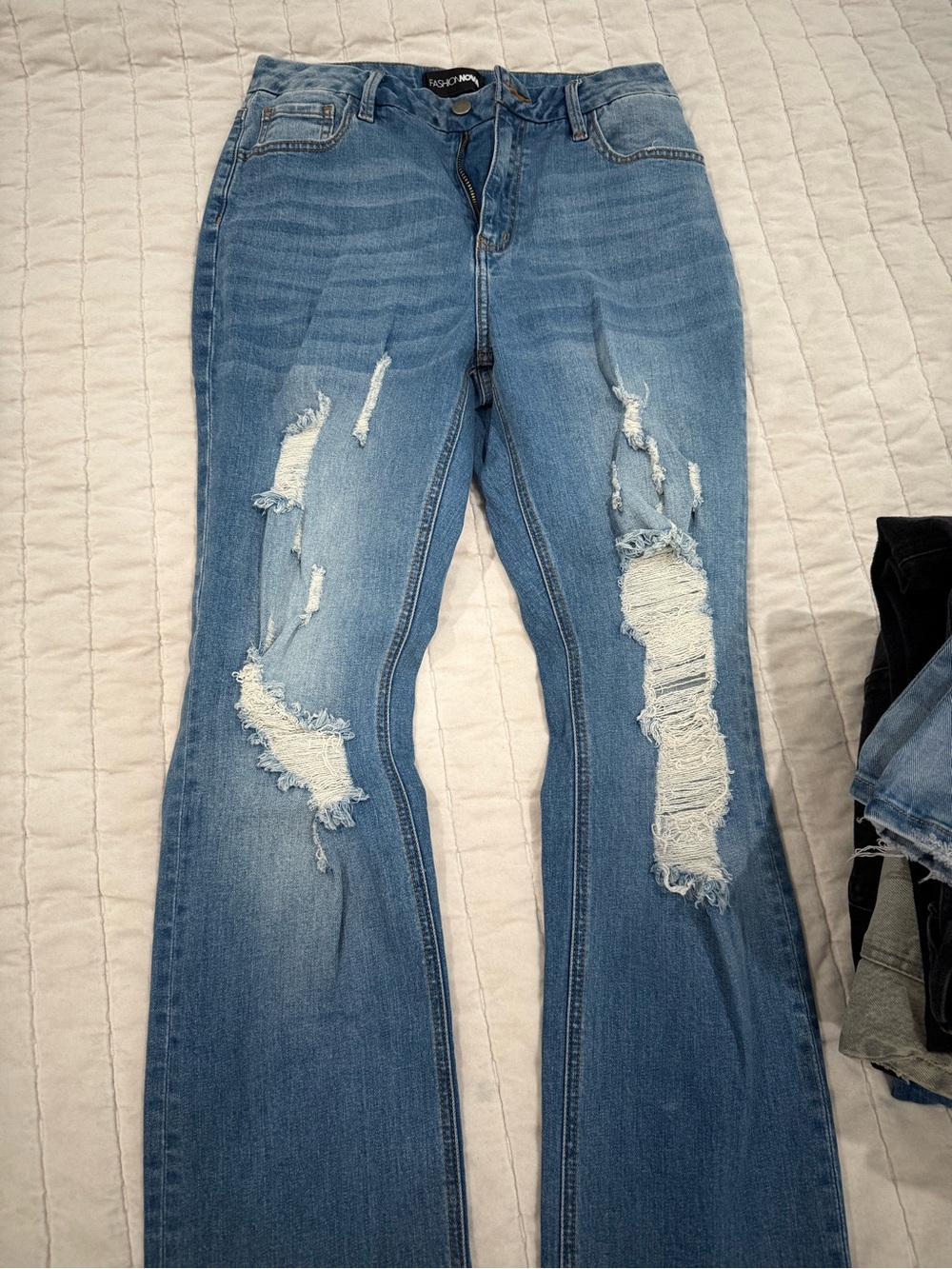 Fashion Nova Light Blue Distressed Flare Jeans